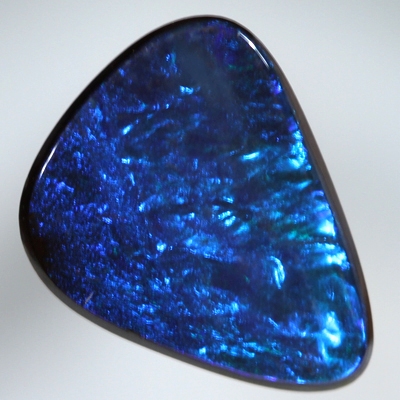 SOLID BOULDER OPAL Bright turquoise blue sparkles over deep ocean blue
